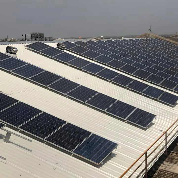 Solar panels installed on industrial rooftop by leading solar panel dealer and solar energy equipment suppliers.